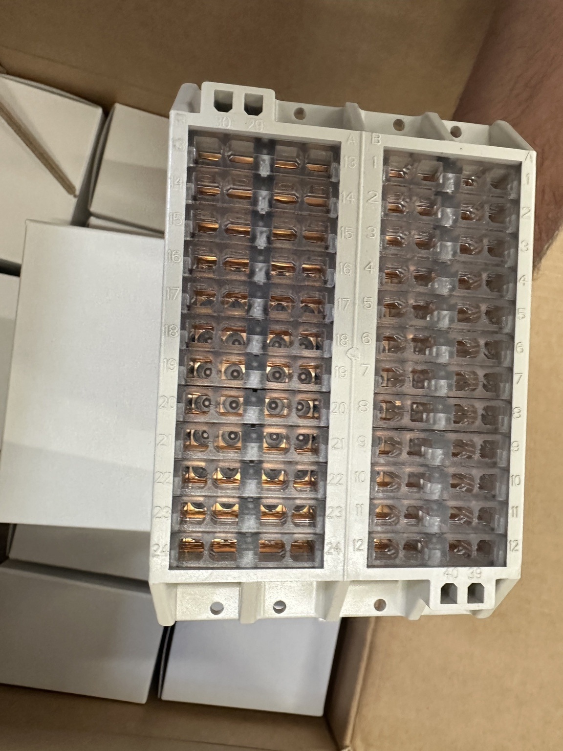 RTXP 24 rear COMBIFLEX contact terminals beneath transparent covers