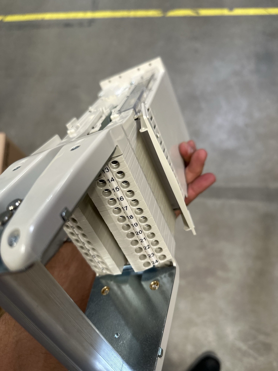 Angled view of RTXP 24 terminal rows and mounting plate
